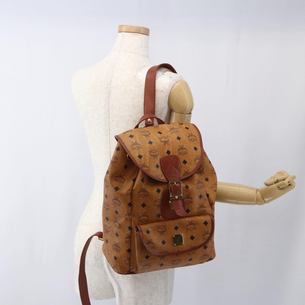 MCM Vicetos Logogram Backpack PVC Leather Brown Gold Auth ka2548