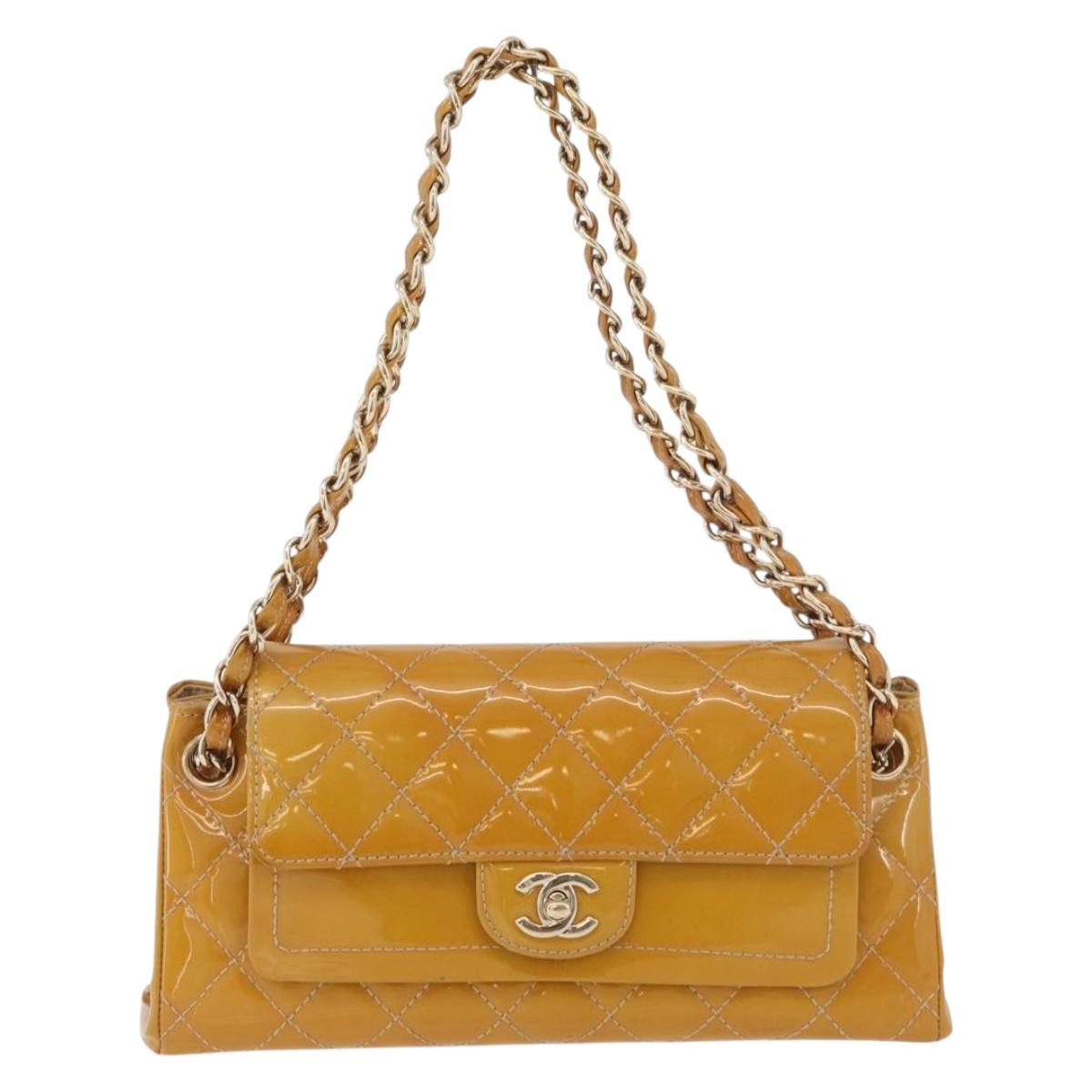CHANEL Matelasse Chain Shoulder Bag Patent leather Yellow Gold CC Auth 100721