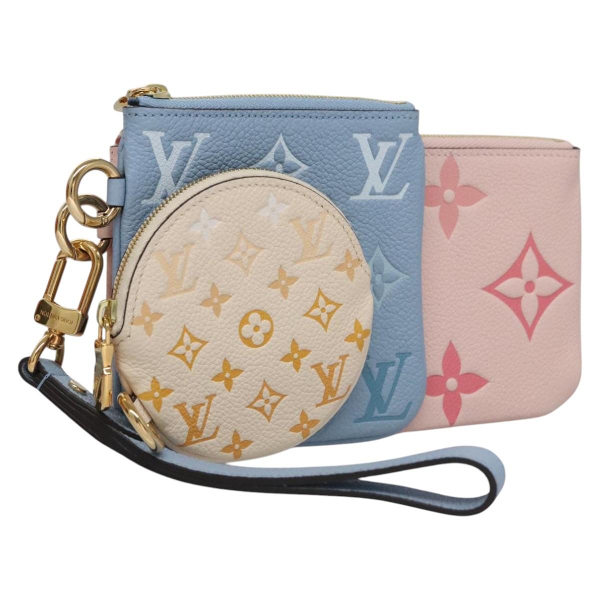 LOUIS VUITTON Monogram Empreinte Pochette Trio Pouch Pink M80407 LV Auth 107585A