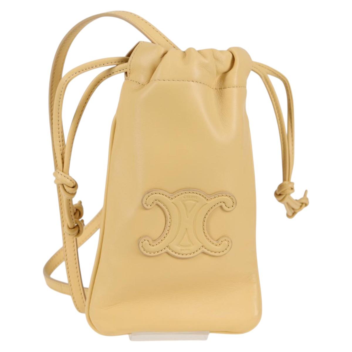 CELINE Cuir Triomphe Drawstring Mobile Pouch Leather Yellow Auth 130196M