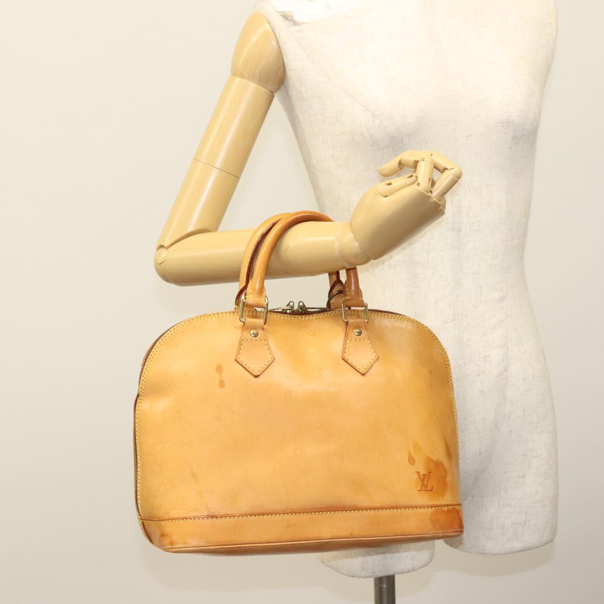 LOUIS VUITTON Nomad leather Alma Hand Bag Beige M85000 LV Auth 132230