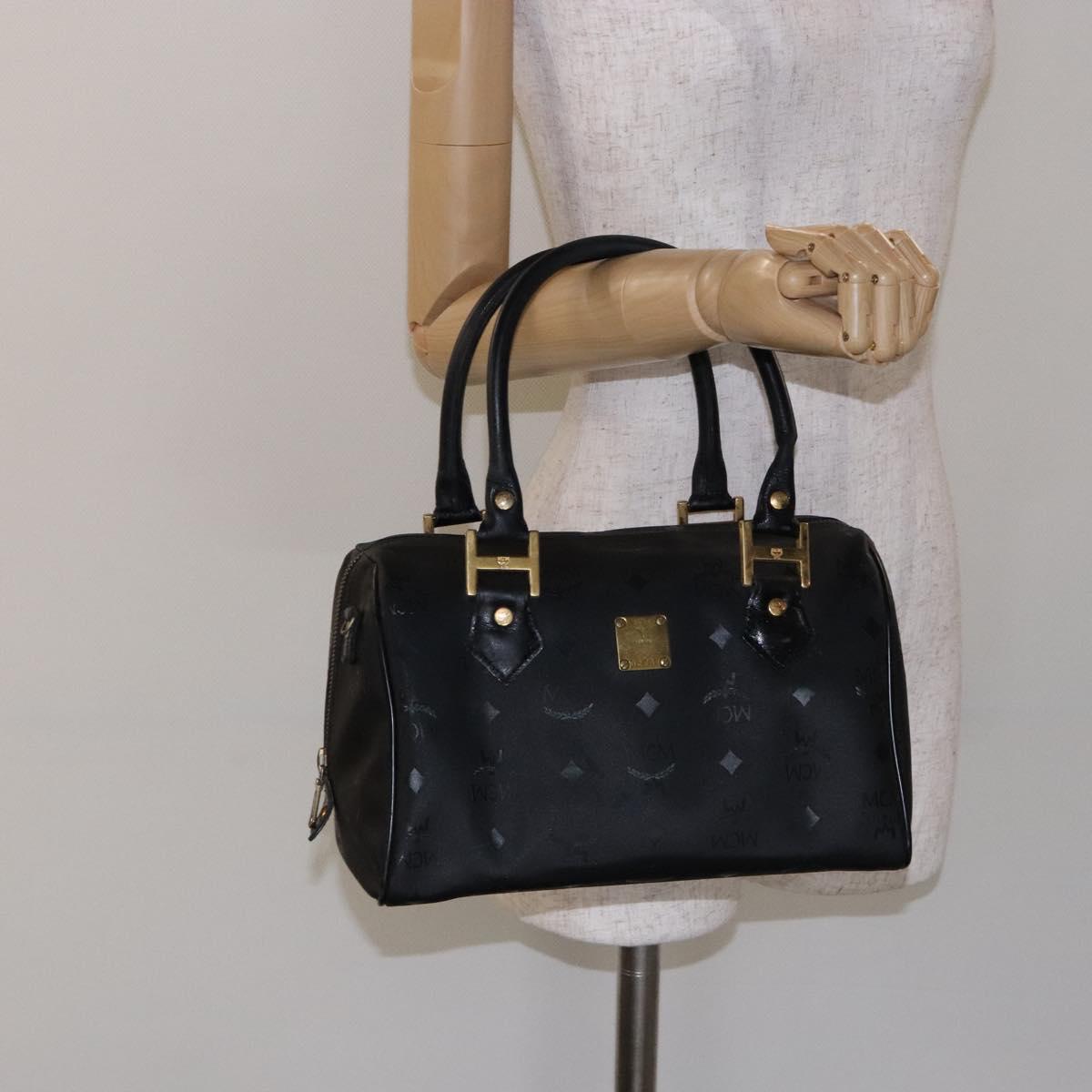 MCM Logogram Vicetos Hand Bag PVC Black Gold Auth 133885