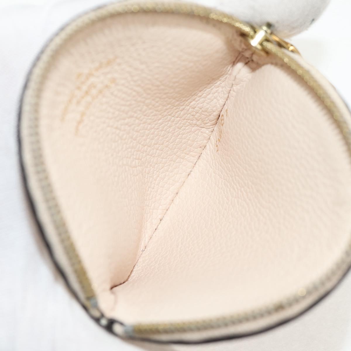 LOUIS VUITTON Monogram Empreinte Pochette Trio Pouch Pink M80407 LV Auth 144344A