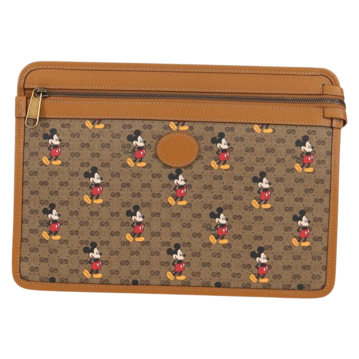 GUCCI GUCCIxDisney GG Supreme Clutch Bag PVC Beige Gold 602552 Auth 152362M
