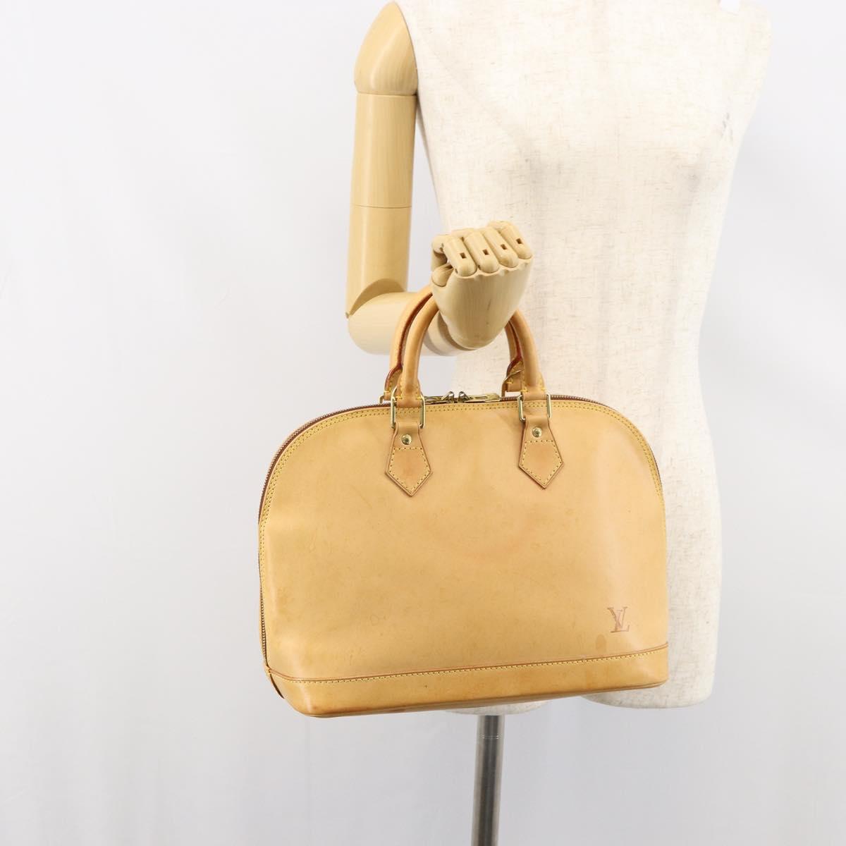 LOUIS VUITTON Nomad leather Alma Hand Bag Beige M85000 LV Auth 154295