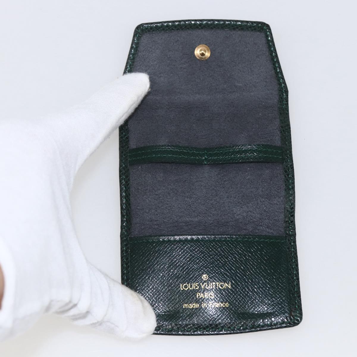 LOUIS VUITTON Taiga Buton De Manchette Cuffs metal Gold Tone LV Auth 156221