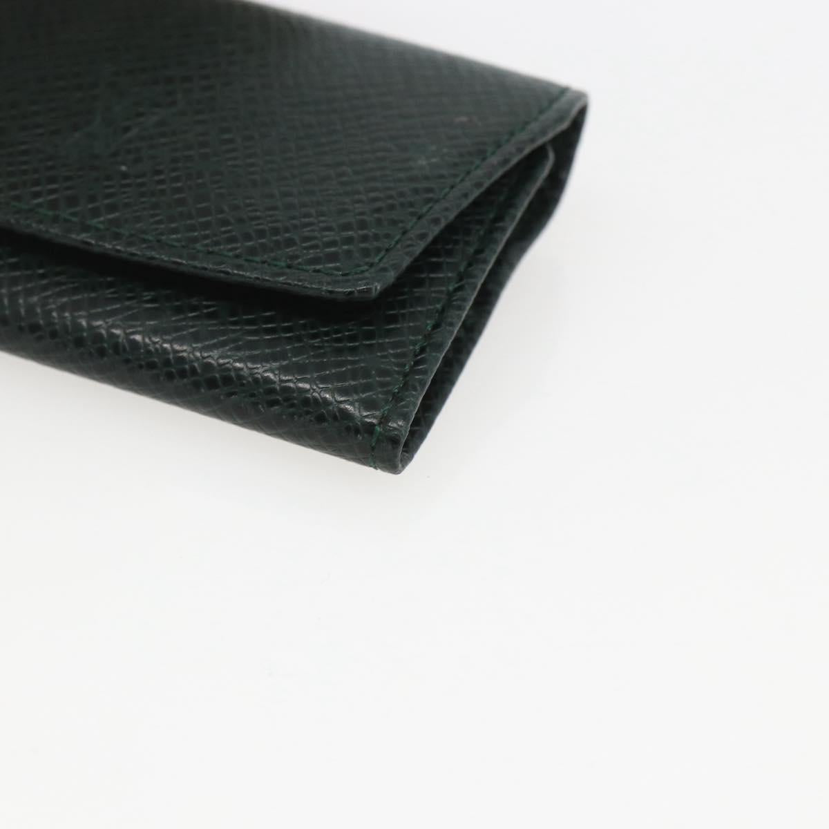 LOUIS VUITTON Taiga Buton De Manchette Cuffs metal Gold Tone LV Auth 156221