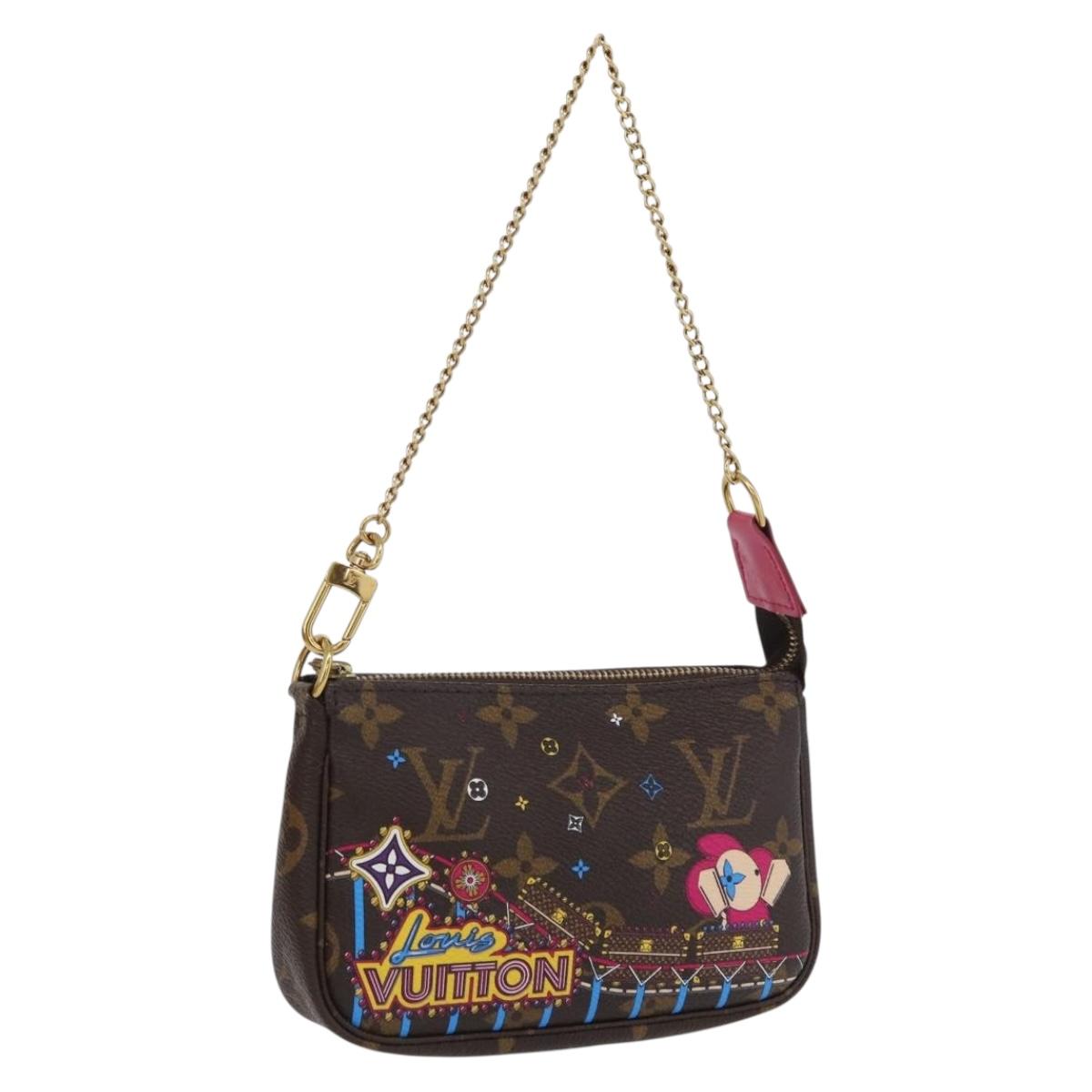 LOUIS VUITTON Monogram Vivienne Mini Pochette Accessoires M69752 Auth 168215SAM