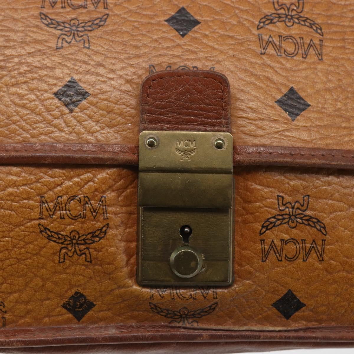 MCM Logogram Vicetos Clutch Bag PVC Leather Brown Gold Auth 169445
