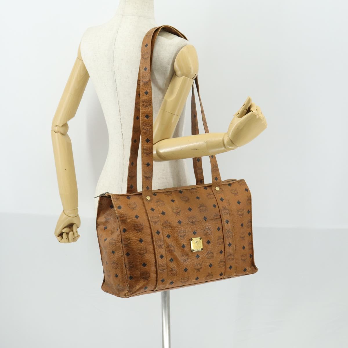MCM Logogram Vicetos Tote Bag PVC Brown Gold Auth 169472