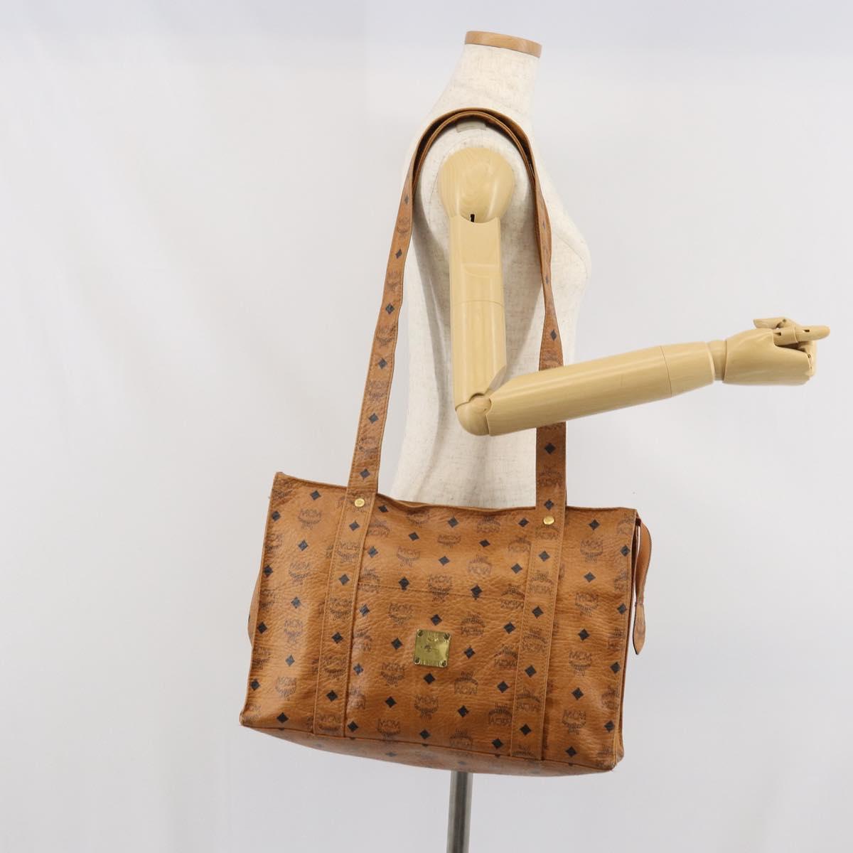 MCM Logogram Vicetos Tote Bag PVC Brown Gold Auth 170245
