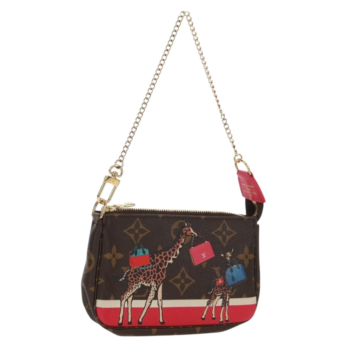 LOUIS VUITTON Monogram Giraffe Mini Pochette Accessoires M62087 LV Auth 172028M
