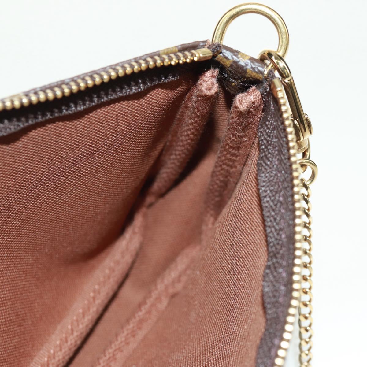 LOUIS VUITTON Monogram Giraffe Mini Pochette Accessoires M62087 LV Auth 172028M