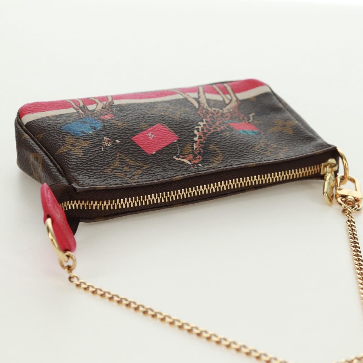 LOUIS VUITTON Monogram Giraffe Mini Pochette Accessoires M62087 LV Auth 172028M