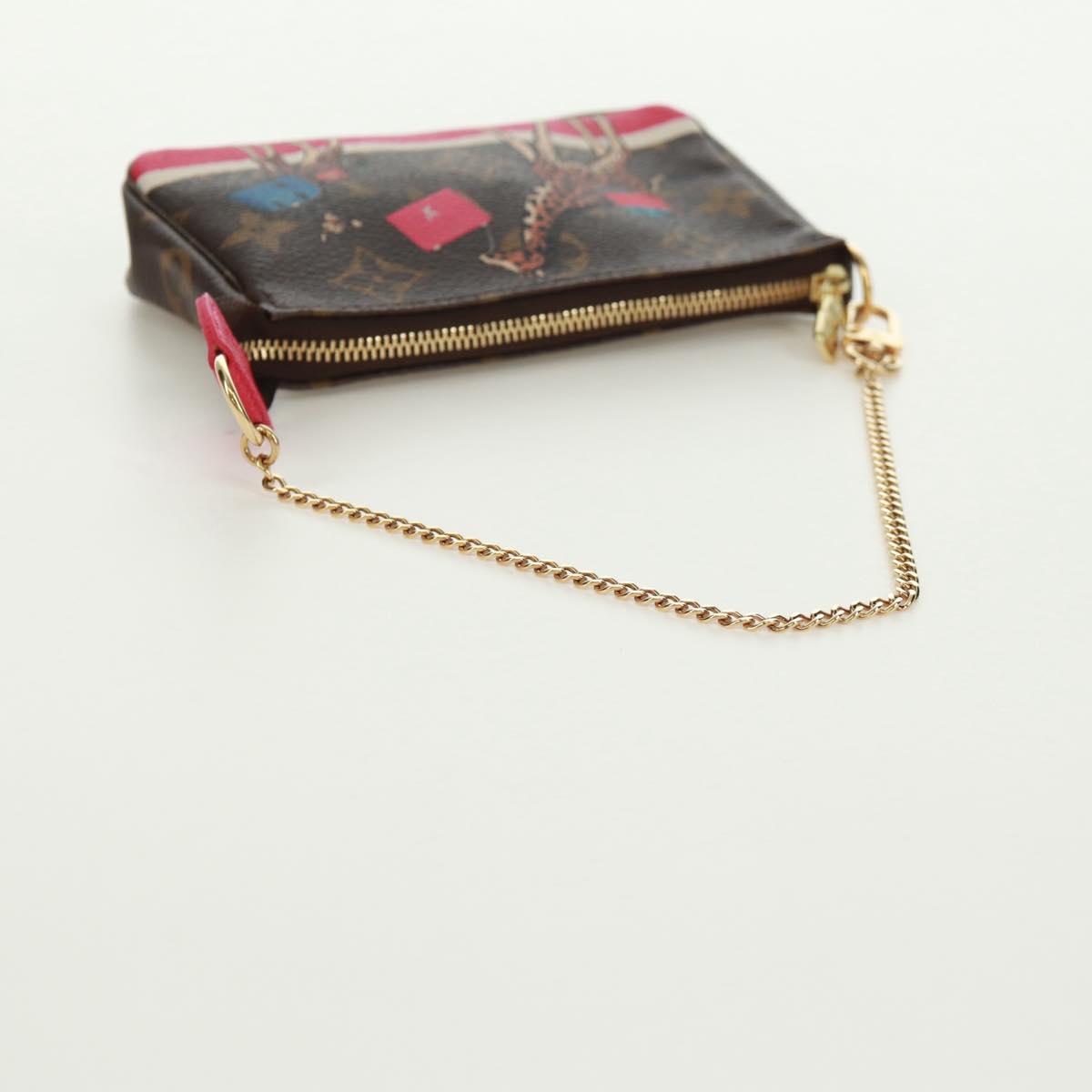 LOUIS VUITTON Monogram Giraffe Mini Pochette Accessoires M62087 LV Auth 172028M