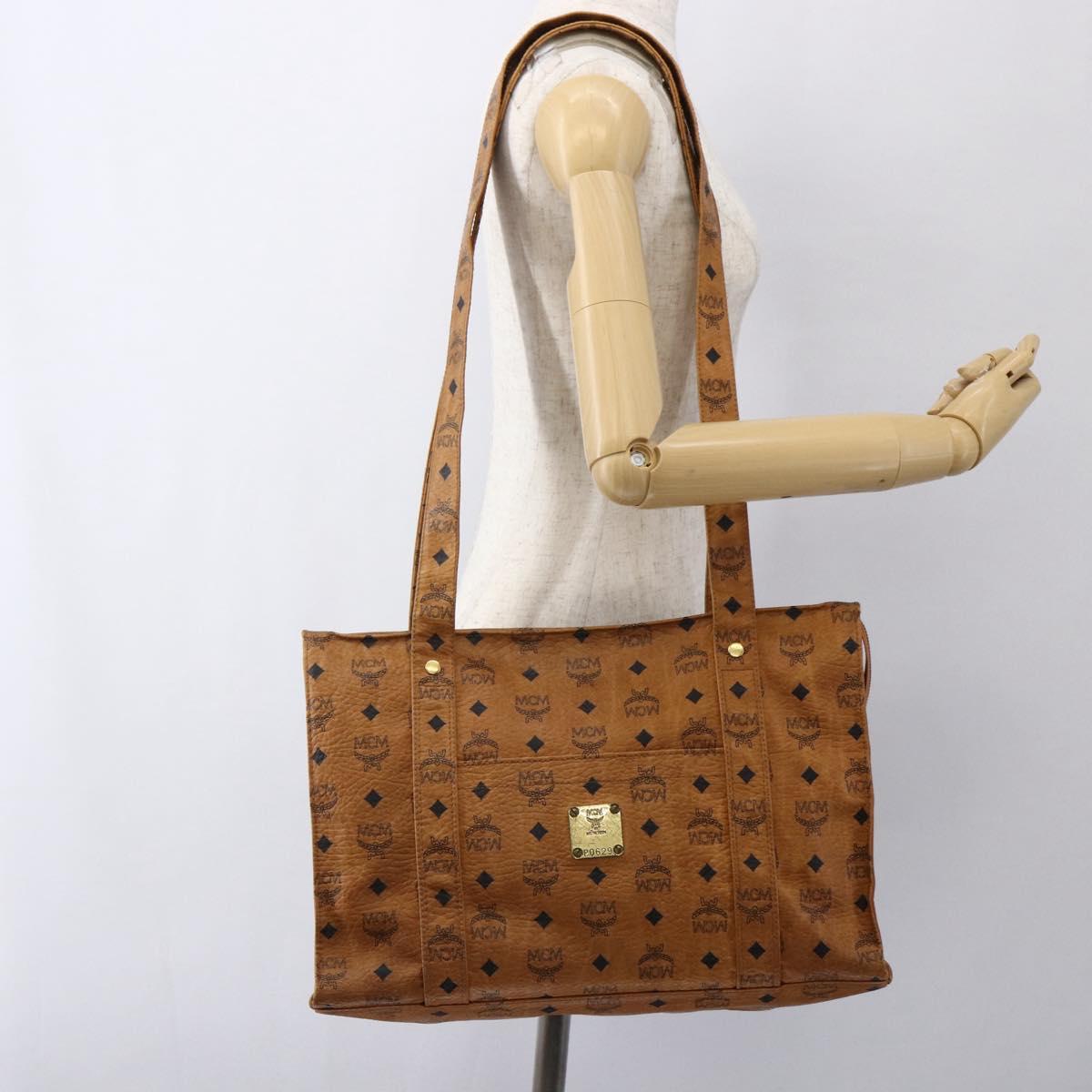 MCM Logogram Vicetos Tote Bag PVC Brown Gold Auth 172275
