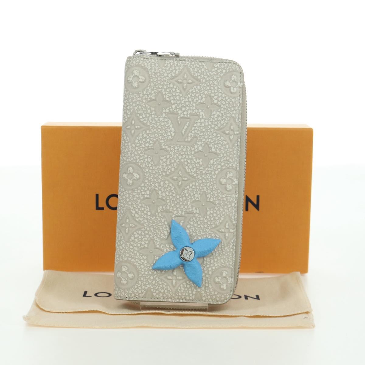 LOUIS VUITTON Taurillon Climbing Zippy Wallet Vertical Ivory M81573 Auth 172432SAM