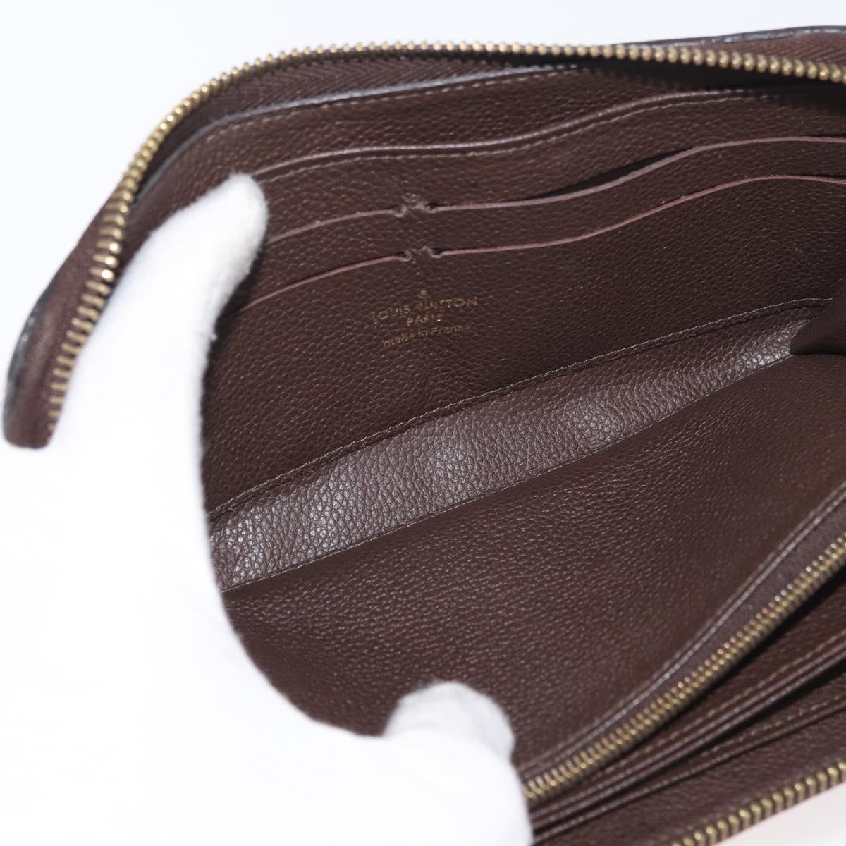 LOUIS VUITTON Monogram Empreinte Zippy Wallet Dark Brown M60548 LV Auth 178383A
