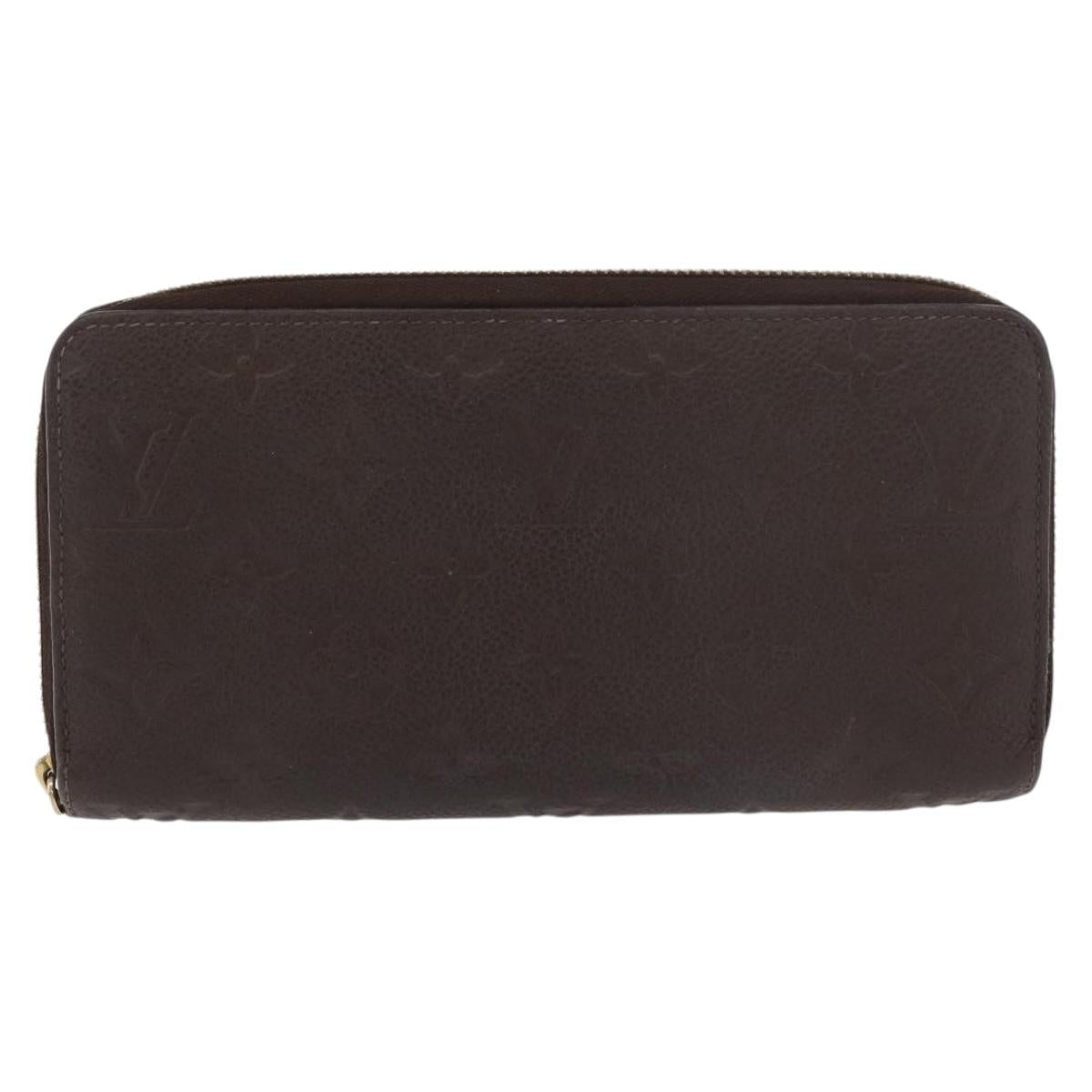LOUIS VUITTON Monogram Empreinte Zippy Wallet Dark Brown M60548 LV Auth 178383A