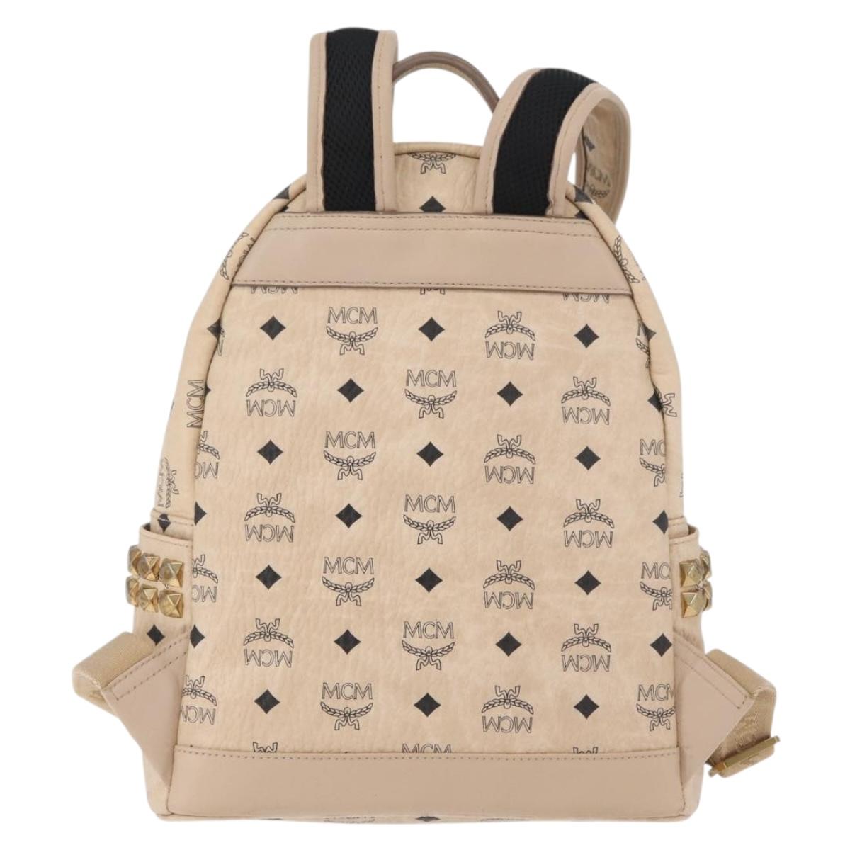 MCM Vicetos Logogram Backpack PVC Leather Ivory Gold Auth 179462