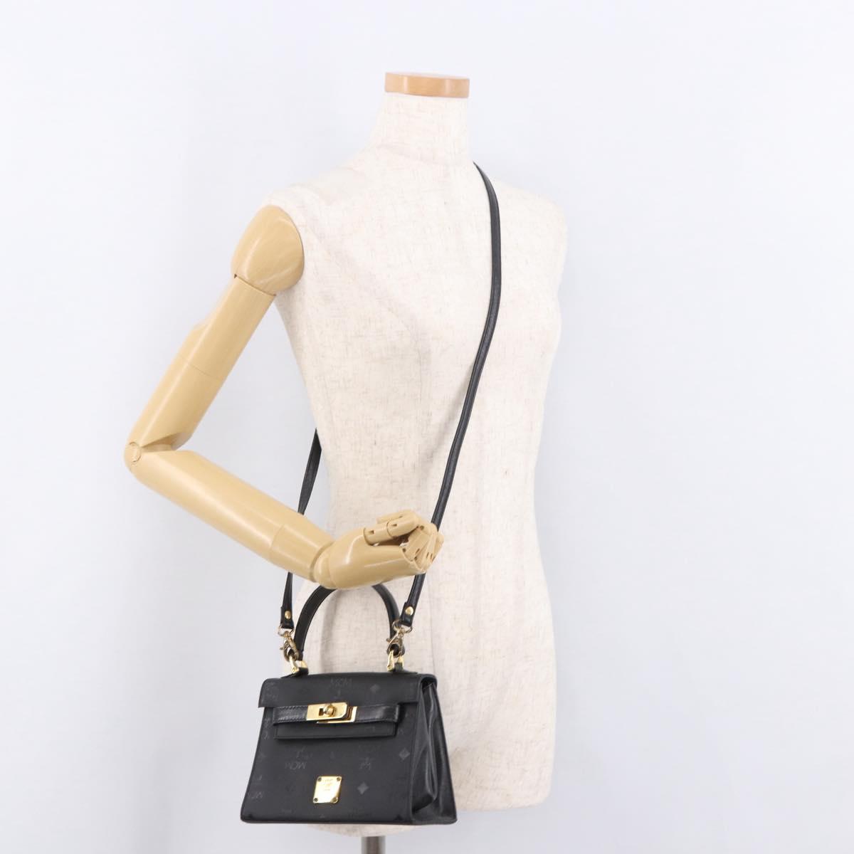 MCM Logogram Vicetos Hand Bag PVC 2way Black Gold Auth 183880A