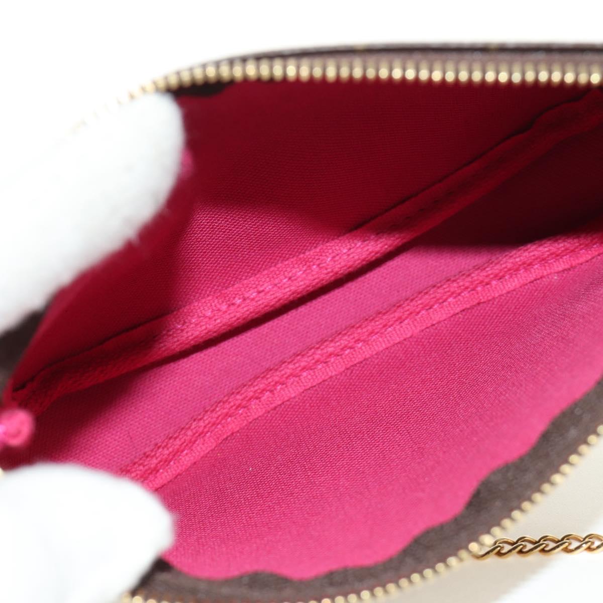 LOUIS VUITTON Monogram Vivienne Mini Pochette Accessoires M69752 Auth 184588SAM