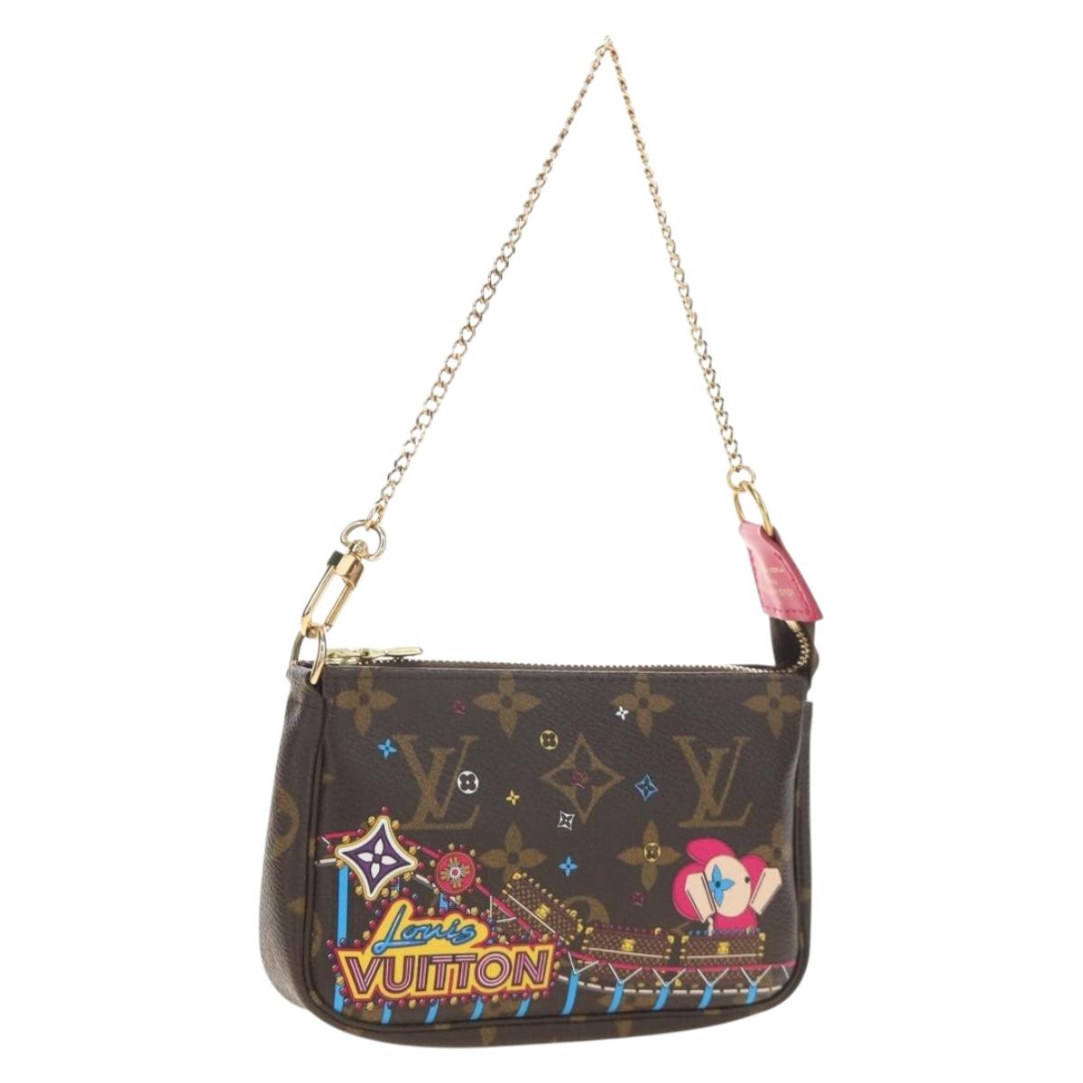 LOUIS VUITTON Monogram Vivienne Mini Pochette Accessoires M69752 Auth 184588SAM