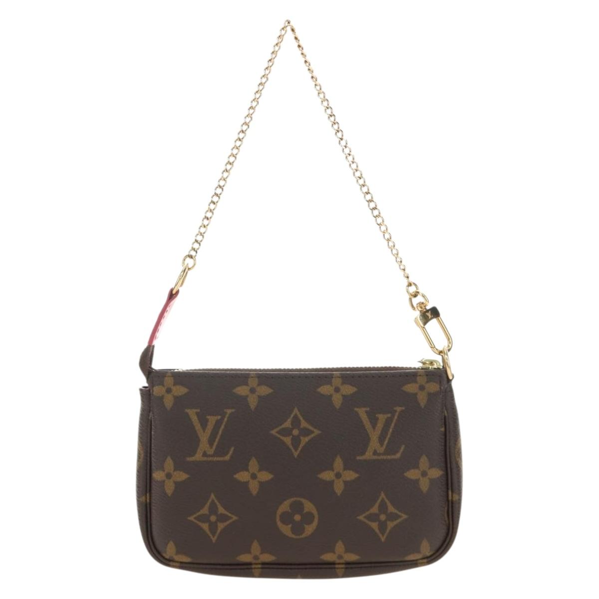 LOUIS VUITTON Monogram Vivienne Mini Pochette Accessoires M69752 Auth 184588SAM