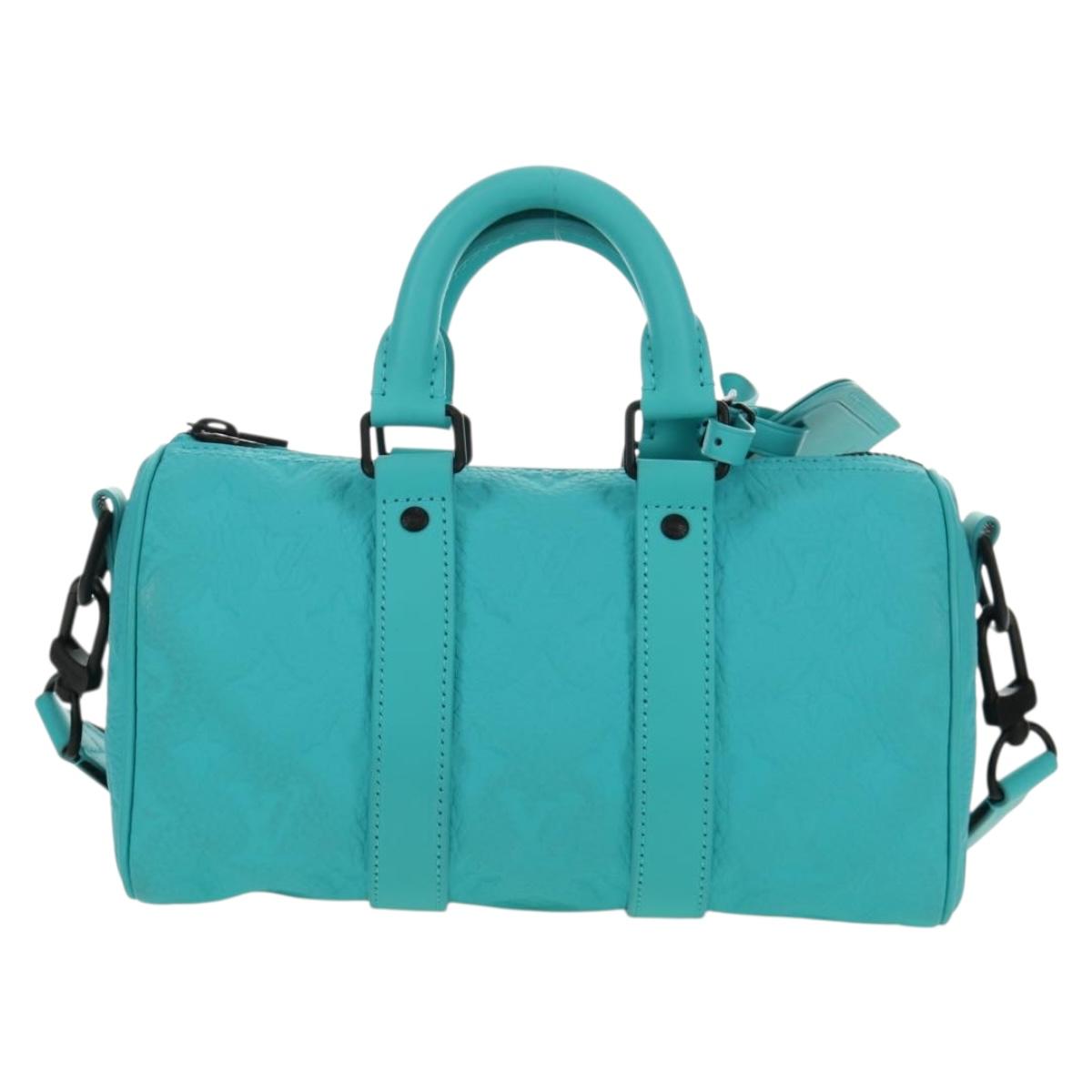 LOUIS VUITTON Taurillon Clemence Keepall Bandouliere 25 Bag M11996 Auth 185940SM