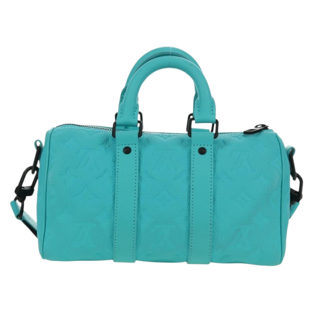 LOUIS VUITTON Taurillon Clemence Keepall Bandouliere 25 Bag M11996 Auth 185940SM
