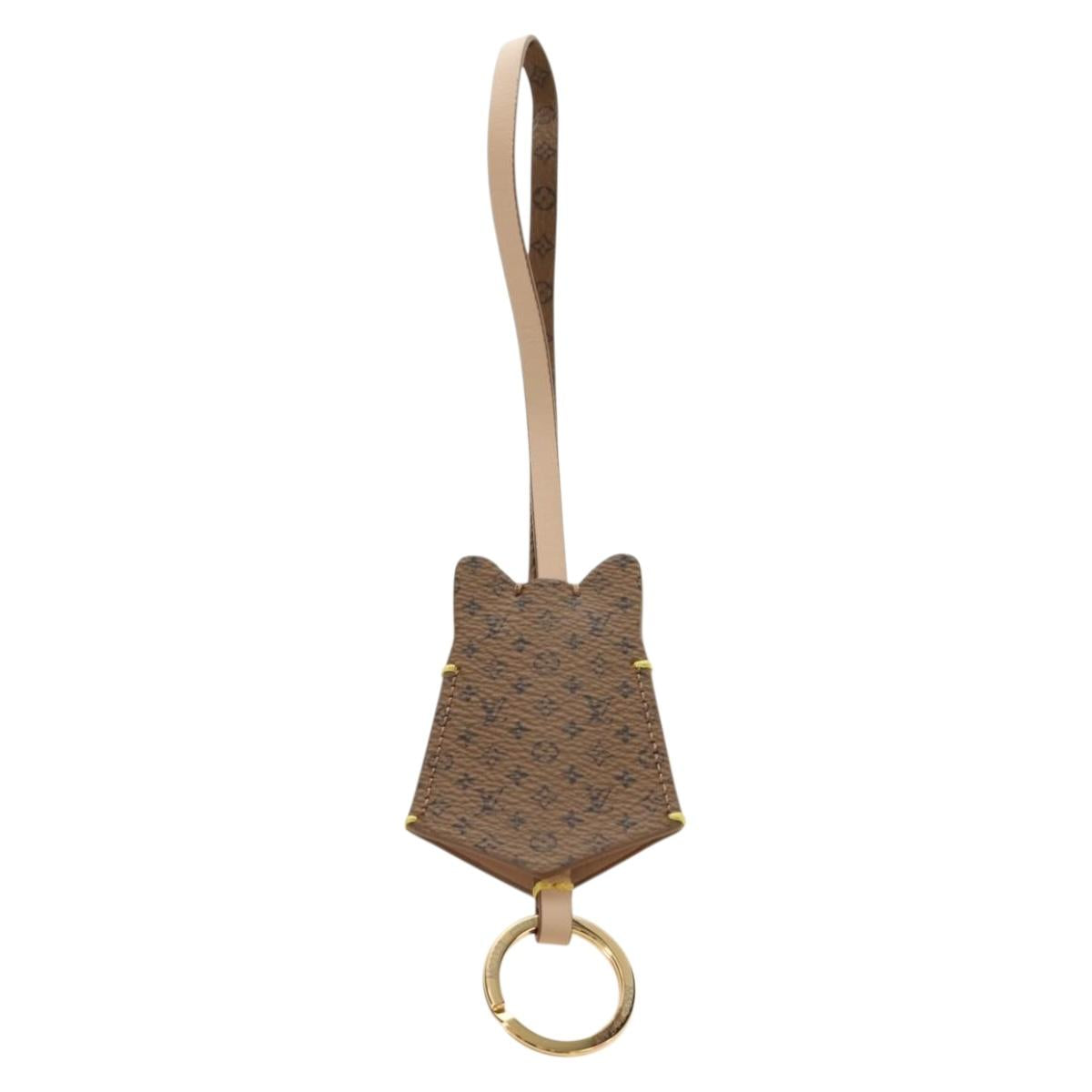 LOUIS VUITTON Monogram Reverse Bag Charm LV Dog Bag Charm M02323 LV Auth 188734M
