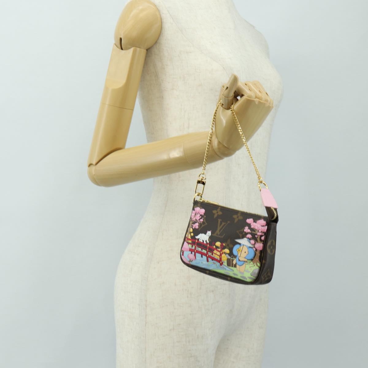 LOUIS VUITTON Monogram Vivienne Mini Pochette Accessoires M45905 Auth 189293SM