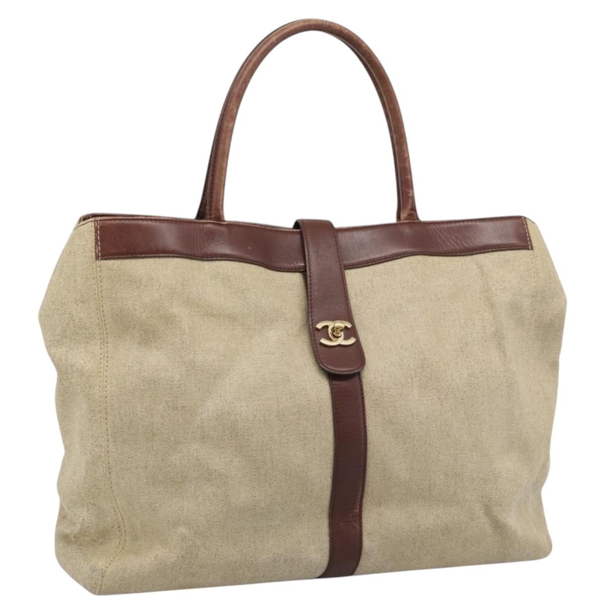 CHANEL Tote Bag Coated Canvas Beige Gold CC Auth 192678