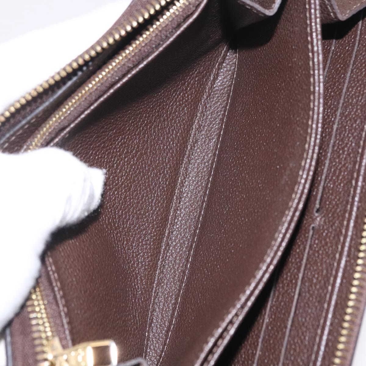 LOUIS VUITTON Monogram Empreinte Zippy Wallet Dark Brown M60548 LV Auth 208340