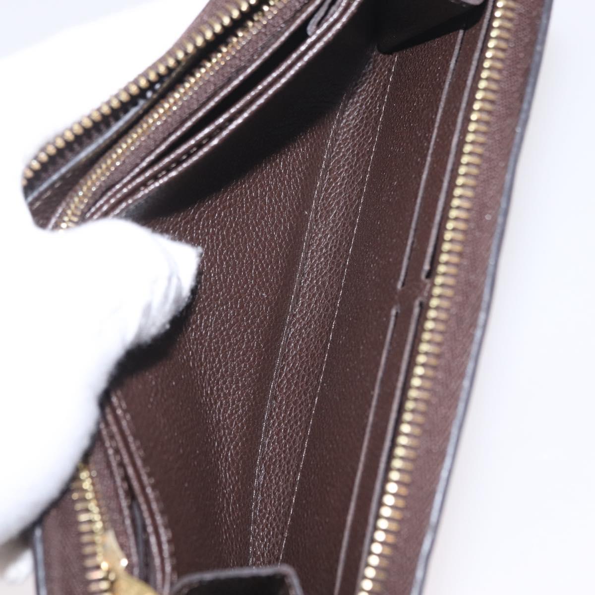 LOUIS VUITTON Monogram Empreinte Zippy Wallet Dark Brown M60548 LV Auth 208340
