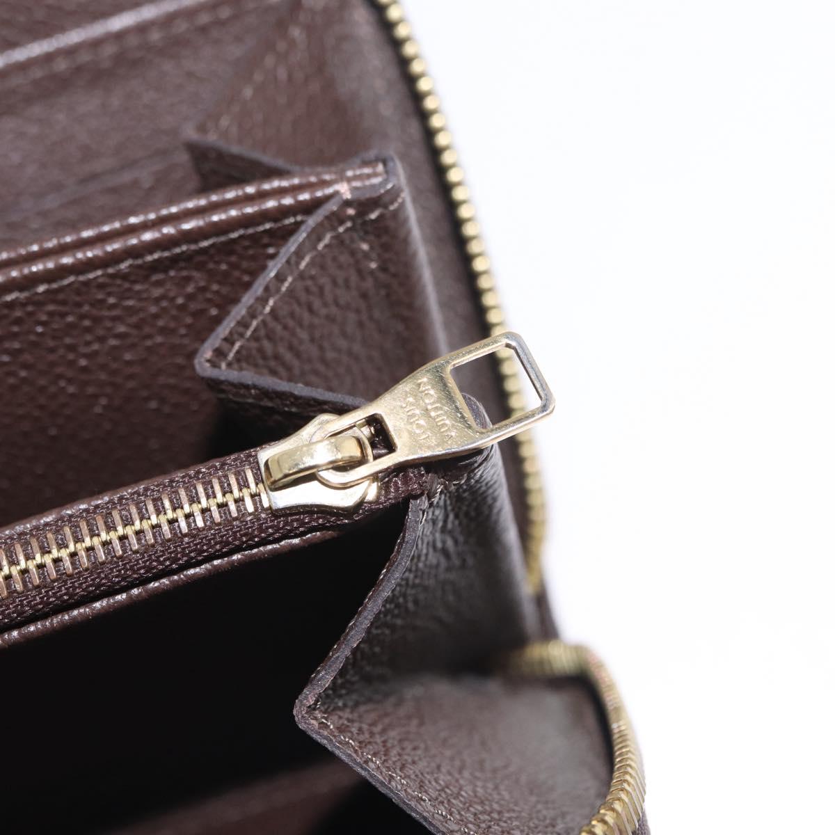 LOUIS VUITTON Monogram Empreinte Zippy Wallet Dark Brown M60548 LV Auth 208340
