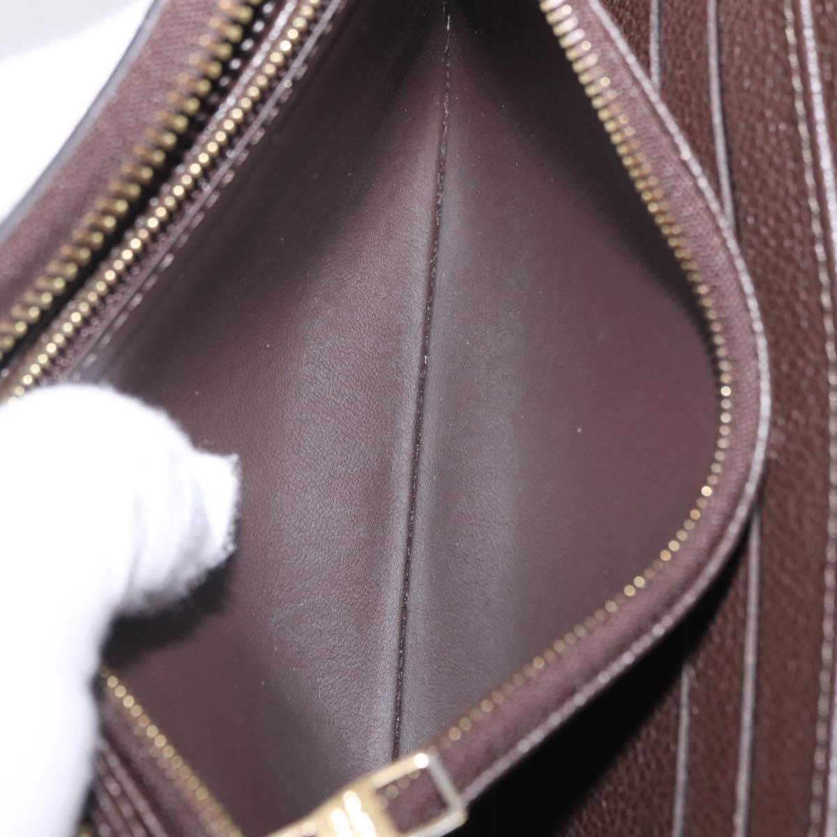 LOUIS VUITTON Monogram Empreinte Zippy Wallet Dark Brown M60548 LV Auth 208340