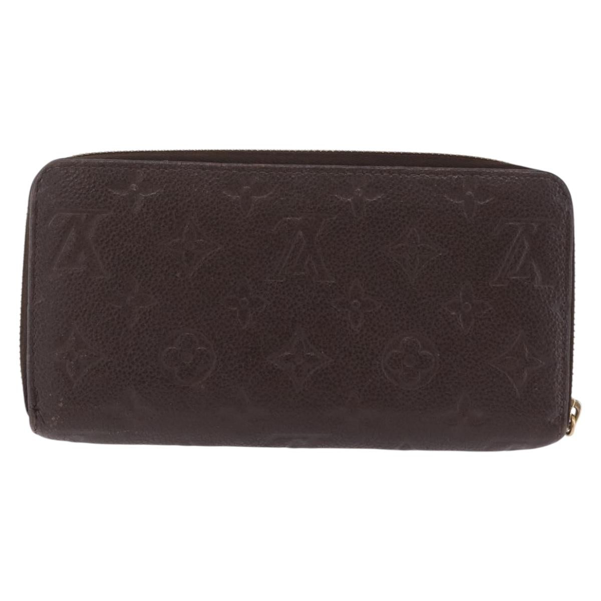 LOUIS VUITTON Monogram Empreinte Zippy Wallet Dark Brown M60548 LV Auth 208340
