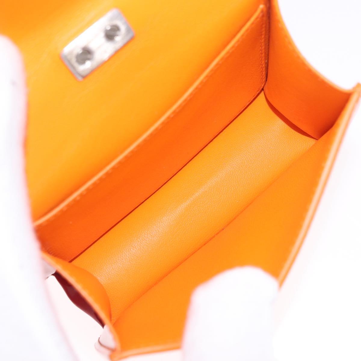 Salvatore Ferragamo Metal Hand Pouch Patent leather Orange Silver Auth 208342M