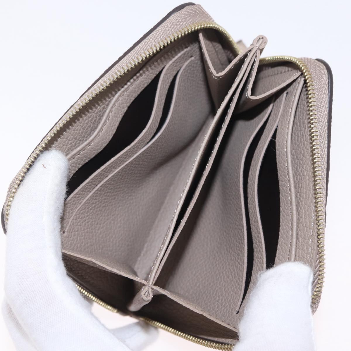 LOUIS VUITTON Taurillon Clemence Monogram Zippy Purse Beige M68696 Auth 209479M