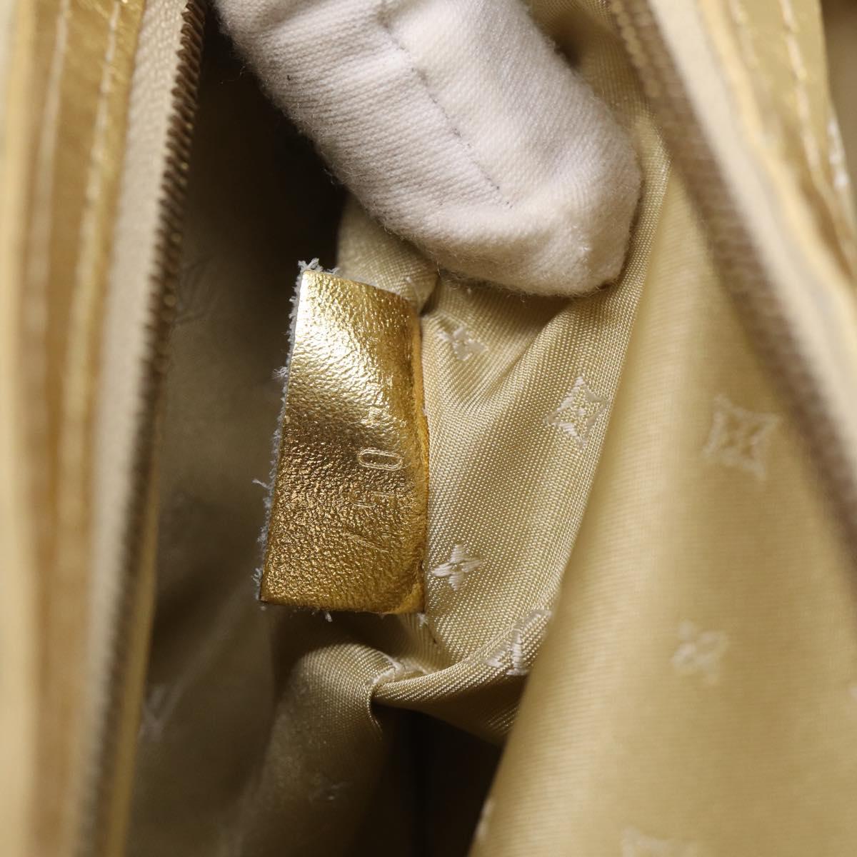 LOUIS VUITTON Suhari Lockit Hand Bag Leather Gold M95433 LV Auth 211489A