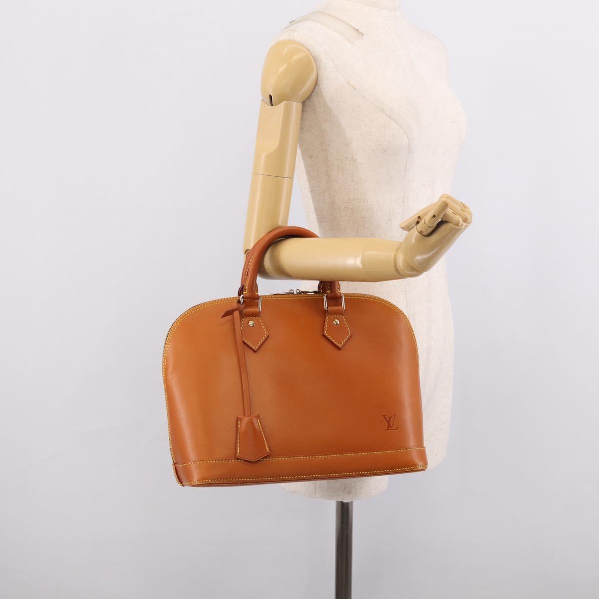 LOUIS VUITTON Nomad leather Alma Hand Bag Beige M85000 LV Auth 211758V
