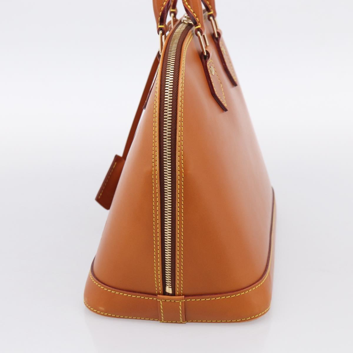 LOUIS VUITTON Nomad leather Alma Hand Bag Beige M85000 LV Auth 211758V