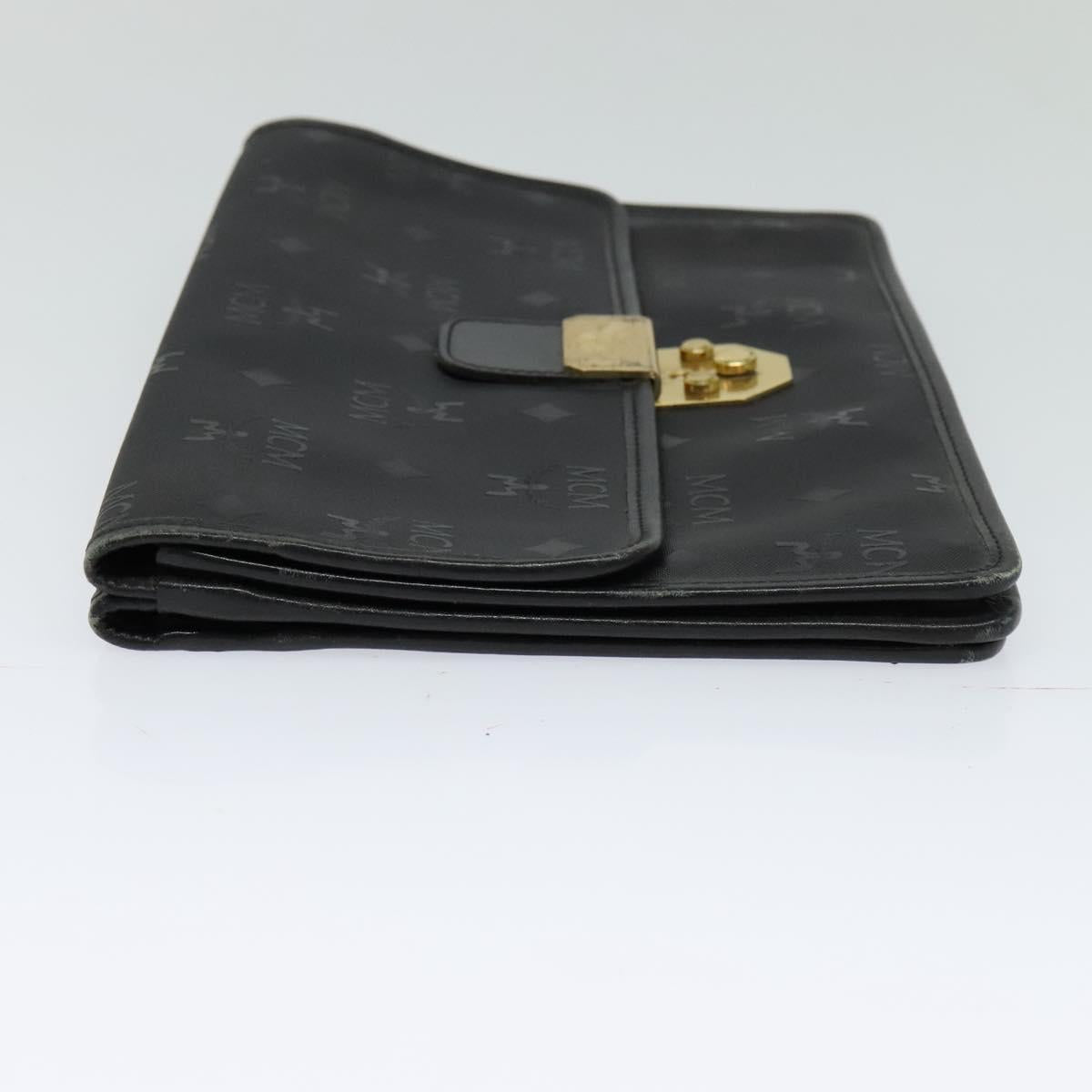 MCM Vicetos Logogram Clutch Bag PVC Black Gold Auth ar13233