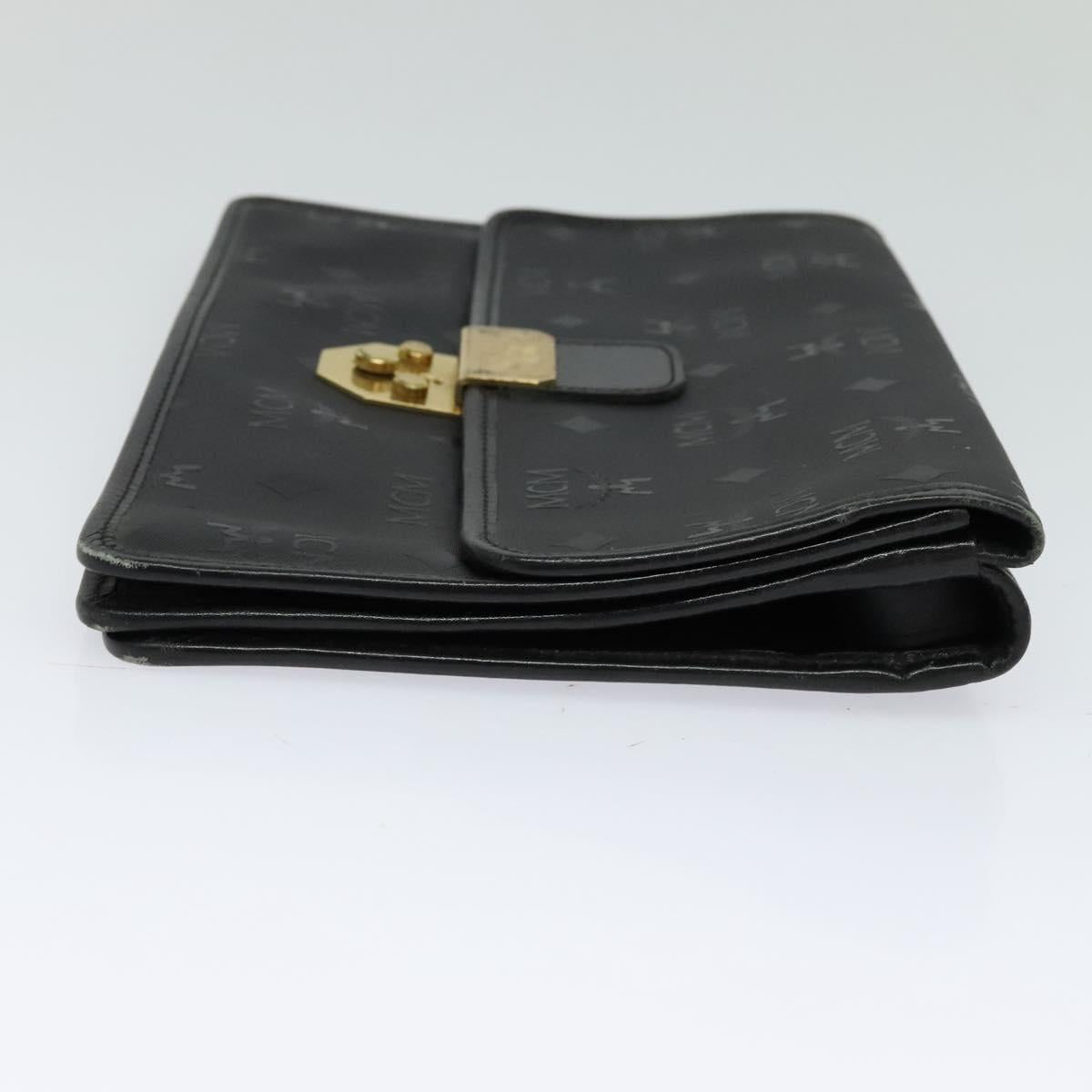 MCM Vicetos Logogram Clutch Bag PVC Black Gold Auth ar13233