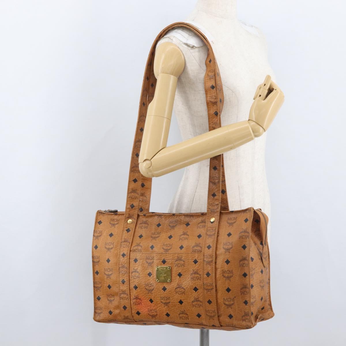 MCM Logogram Vicetos Tote Bag PVC Brown Gold Auth BA10957