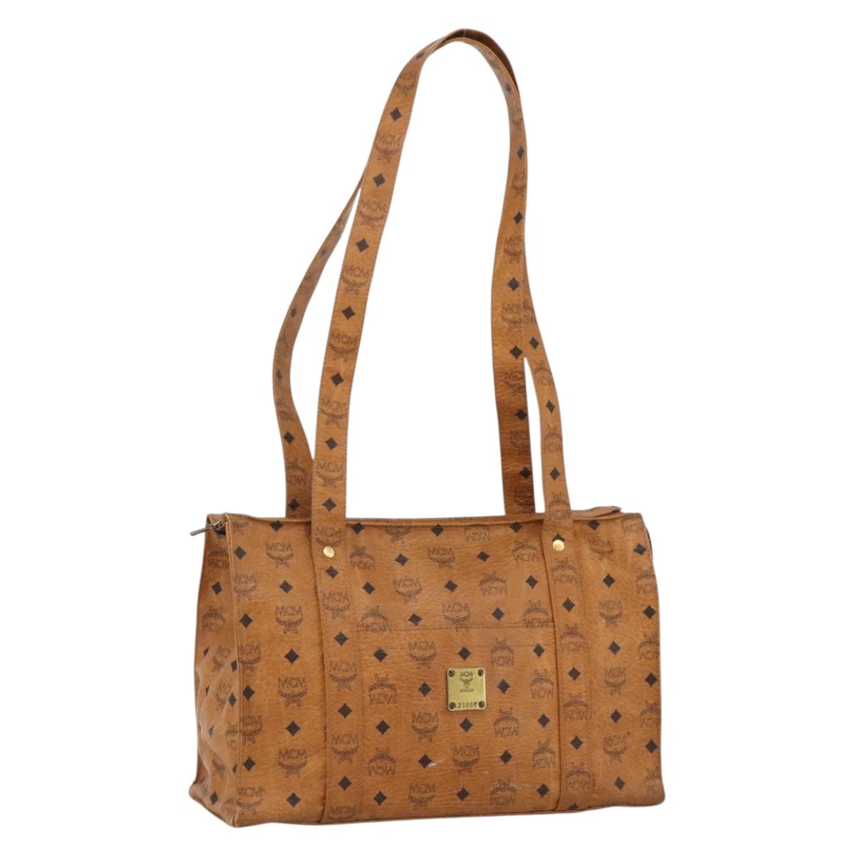 MCM Logogram Vicetos Tote Bag PVC Brown Gold Auth BA11113