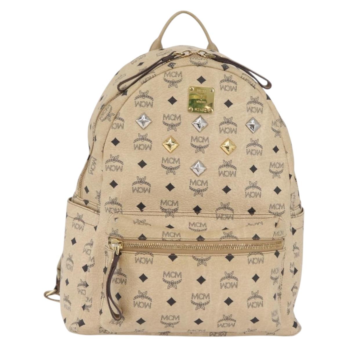 MCM Logogram Vicetos Backpack PVC Leather Beige Gold Silver Auth BA11136