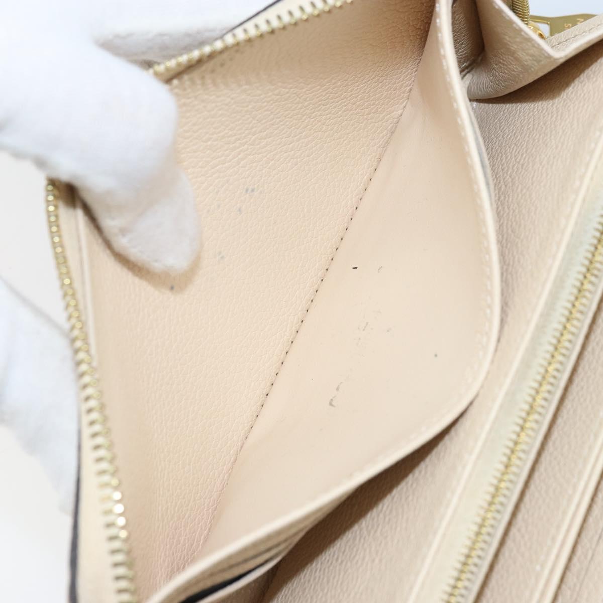 LOUIS VUITTON Monogram Empreinte Zippy Long Wallet White TN0146 LV Auth BA11828