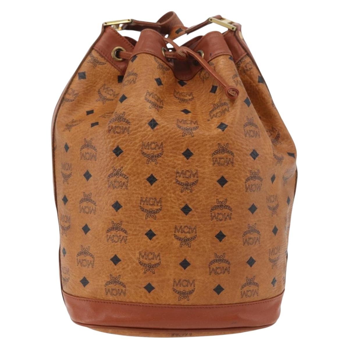 MCM Vicetos Logogram Drawstring Bag Bag PVC Leather Brown Gold Auth BA12441A